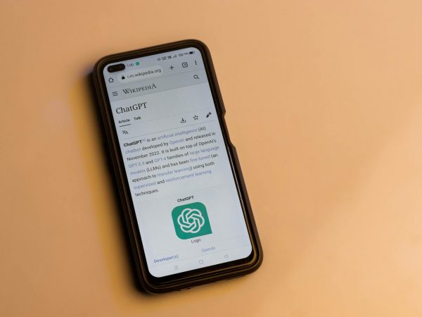 webpage of chatgpt a prototype ai chatbot is seen on the website of openai on a smartphone examples capabilities and limitations are shown