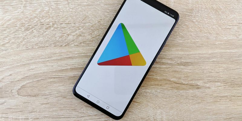 smart phone with a logo on a wooden table