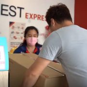 BEST Express Malaysia counter service - customer dropping off parcel at service point