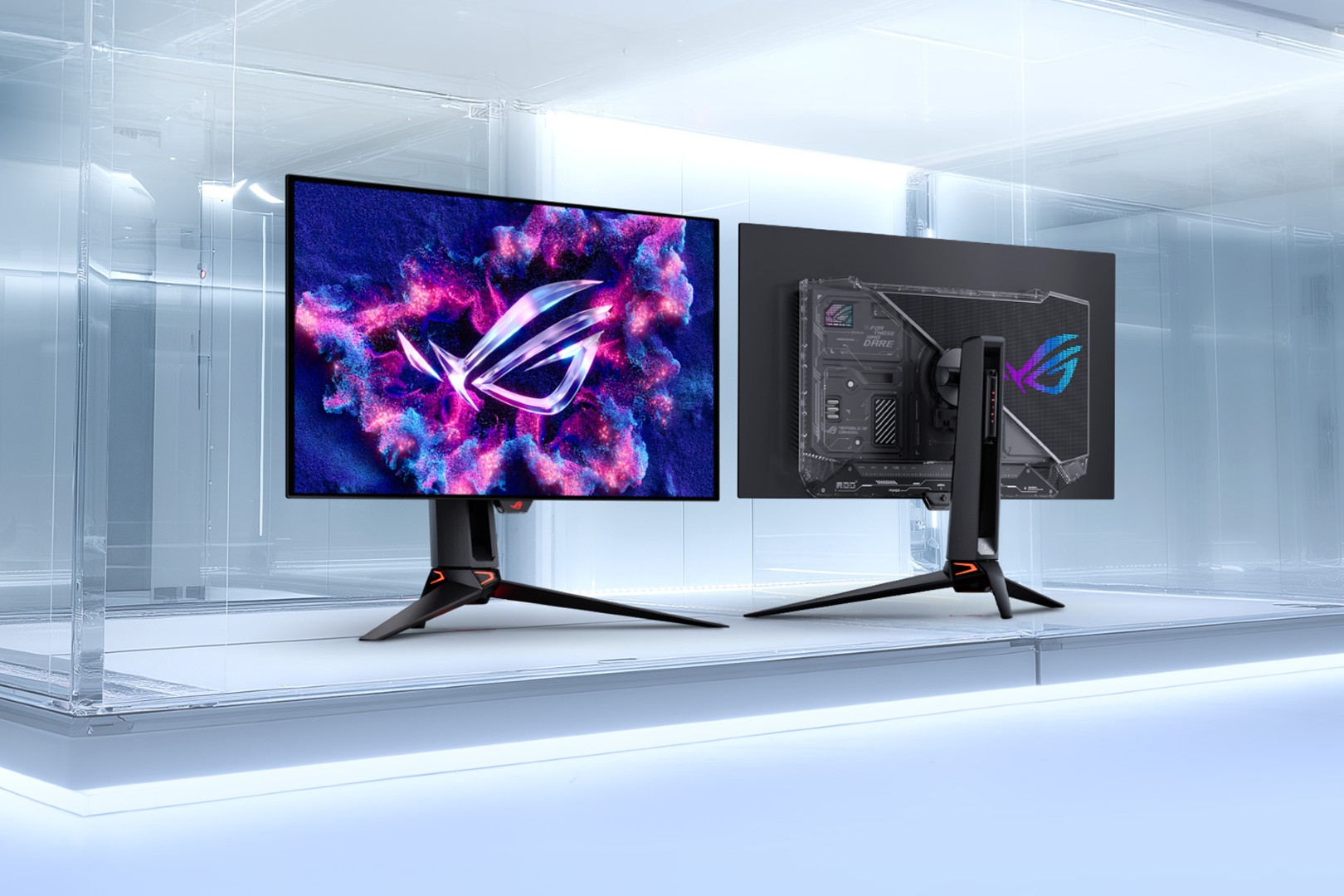 ASUS ROG Brings Tandem RGB OLED Gaming Monitors to Malaysia This October 3 ROG Swift OLED PG27UCWM on a gaming desk setup with ROG peripherals and PC tower