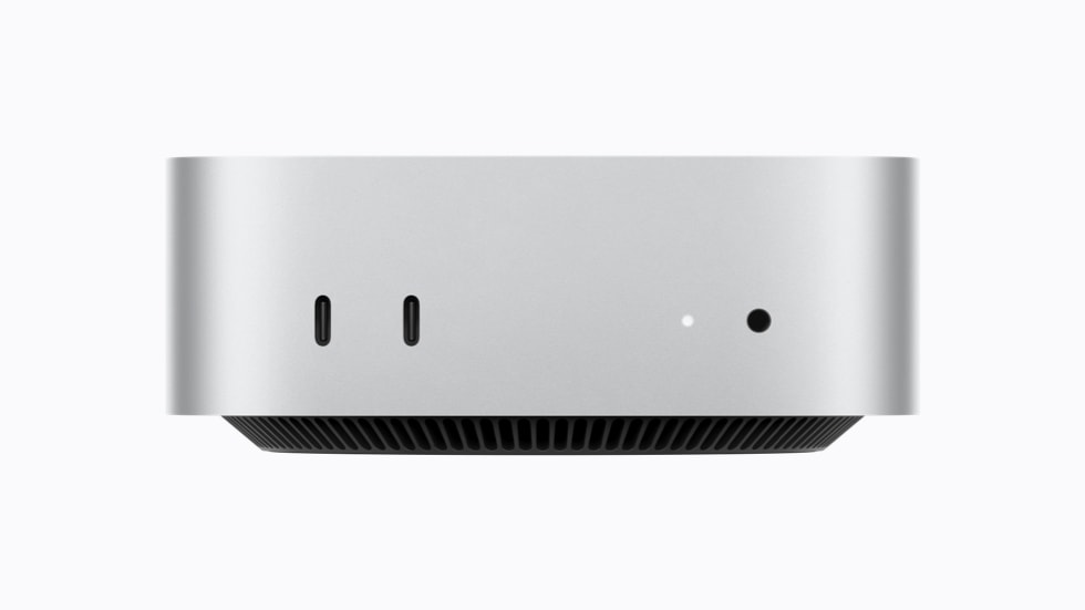 Mac mini front panel showing two USB-C ports and a headphone jack