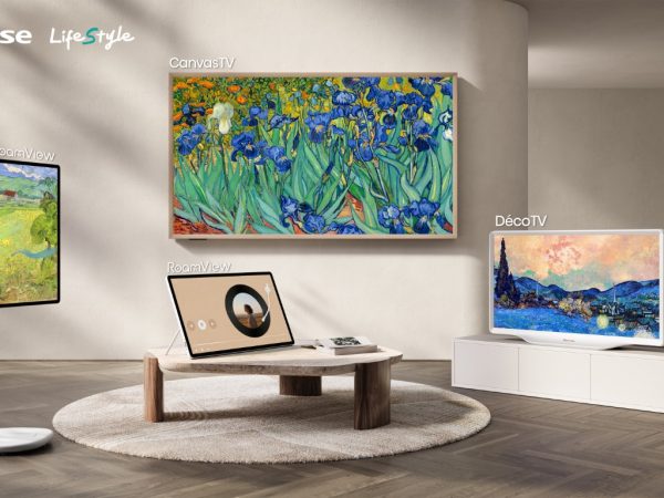 Hisense RoamView portable display alongside CanvasTV wall display, RoamView table stand, and DécoTV cabinet display in a Malaysian living room
